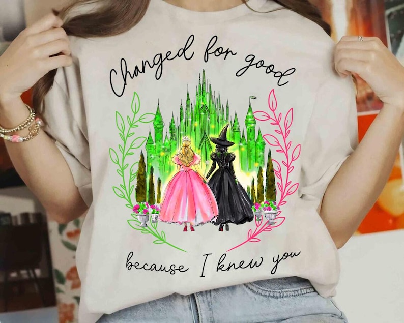 a woman wearing a t - shirt that says, changed for good because i knew