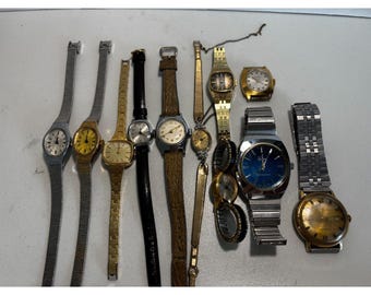 Lot of 11 vintage men's and women's manual wind watches, mostly Timex
