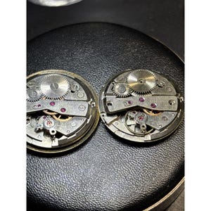 UTC-Unitime cal. 27 watch movements for parts/repair, new balance wheel Bild 1