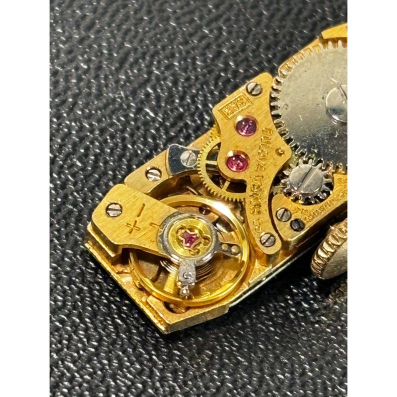 Bulova AK3 movement with Nivada dial women's watch, running image 3
