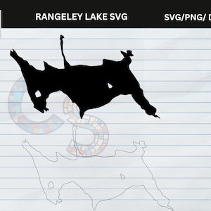May include: Black silhouette of Rangeley Lake SVG design, with the text "RANGELEY LAKE SVG" and "SVG/PNG/ DXF/EPS". The design is on a lined paper background, with a colorful logo in the upper left corner.