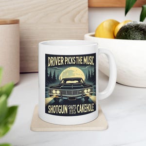 Driver Picks the Music Mug  Supernatural Inspired Quote