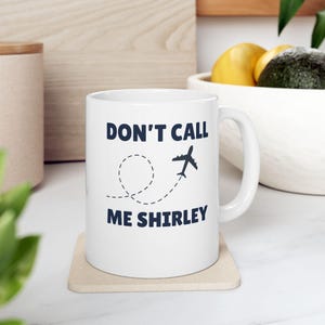 Nennt mich nicht Shirley Airplane! Film Zitat Becher