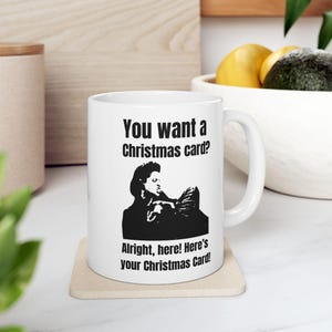 Caneca de cartão de Natal Seinfeld - Saudação de Natal inesquecível de Elaine
