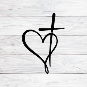 Puede incluir: Diseño negro de corazón y cruz sobre un fondo blanco con vetas de madera. El corazón es un contorno simple, y la cruz está colocada encima y a través del corazón. El diseño es de un solo color y parece un gráfico o calcomanía.