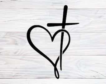May include: Black heart and cross design on a white wood-grain background. The heart is a simple outline, and the cross is positioned above and through the heart. The design is a single color and appears to be a graphic or decal.