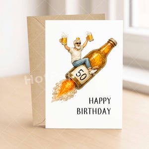 May include: A birthday card featuring a man riding a beer bottle rocket, holding two mugs of beer. The bottle is labeled with the number 50. The card reads "HAPPY BIRTHDAY" in black text. An envelope is included.