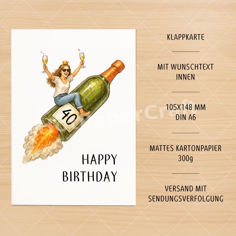 May include: A birthday card with a woman riding a champagne bottle rocket, holding champagne glasses. The card reads "Happy Birthday" and features the number "40". The card is 4.1 x 5.8 inches.