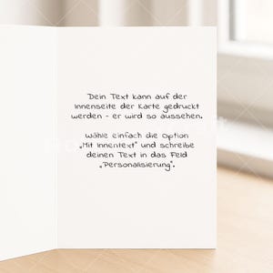 May include: A white greeting card with German text. The text reads: "Your text can be printed on the inside of the card - it will look like this. Simply select the option 'With inner text' and write your text in the 'Personalization' field."