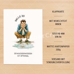 May include: A white greeting card featuring a cartoon illustration of a person crouching and looking at a paper boat in a puddle. The text reads "HALLO 30" and "ERWACHSENWERDEN IST OPTIONAL". The card is 105x148 mm, DIN A6 size, made of 300g matte cardstock.