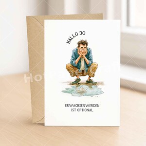 May include: A white greeting card featuring a cartoon illustration of a person crouching and looking at a paper boat in a puddle. The text reads "HALLO 30" at the top and "ERWACHSENWERDEN IST OPTIONAL" at the bottom. A brown envelope is behind the card.