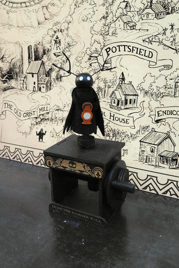 A hand-carved wooden automaton of The Beast from 'Over the Garden Wall' — a mechanically animated fan-art piece that's genuinely one-of-a-kind and instantly recognizable to OTGW fans.