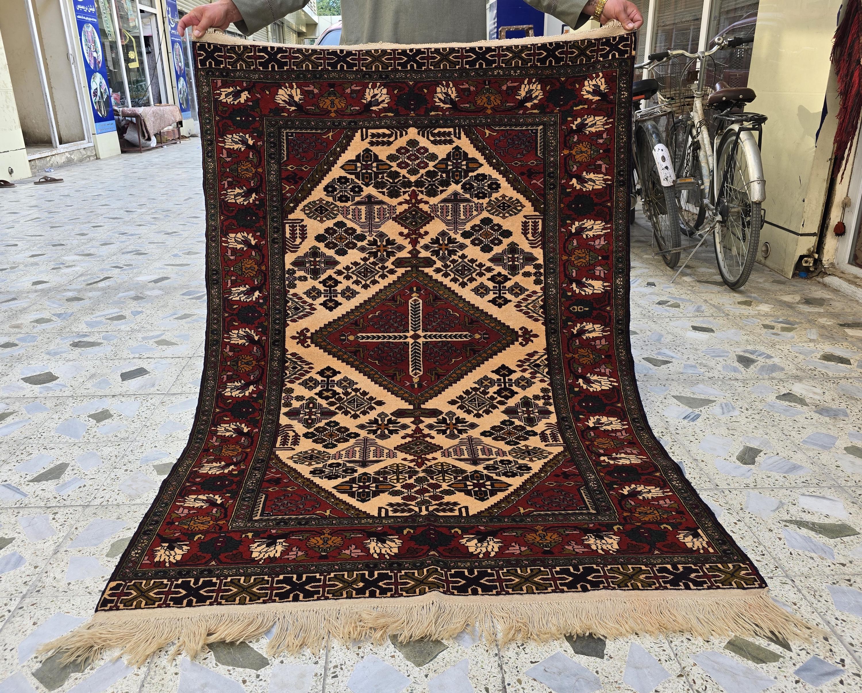 ハンドメイドのアフガニスタン産ヘラティウールラグ：トルクメン幾何学