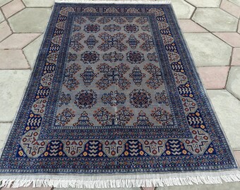 Handcrafted Wool Saruki Rug: Traditional Turkmen Carpet (6.7x5.1 ft)