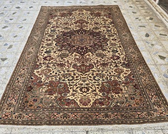 アンティークの手織りペルシャ カシュガイ クッションサイズのラグ