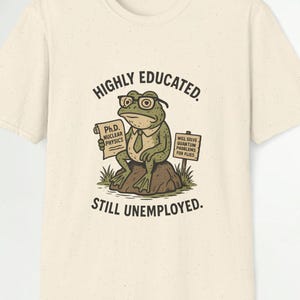 おもしろカエルTシャツ、高学歴なのに失業中、ヴィンテージ漫画Tシャツ、失業中の天才カエルTシャツ、博士号取得ユーモアTシャツ、オタクジョークギフト