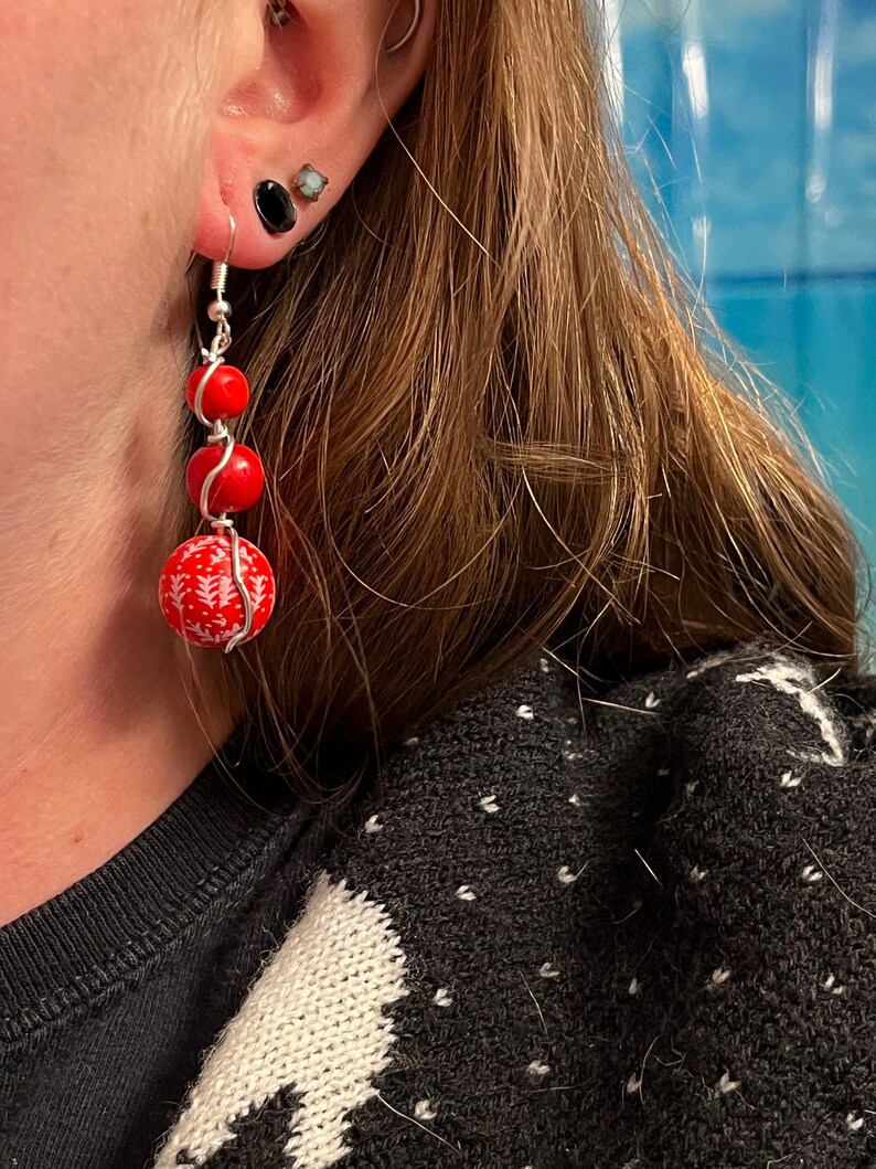 Christmas earrings wrapped in silver wire. Red winter beads. Festive earrings image 4