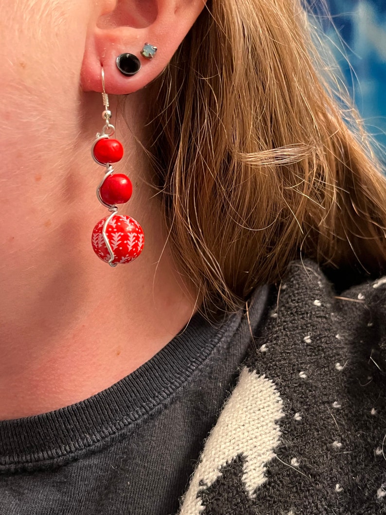 Christmas earrings wrapped in silver wire. Red winter beads. Festive earrings image 1