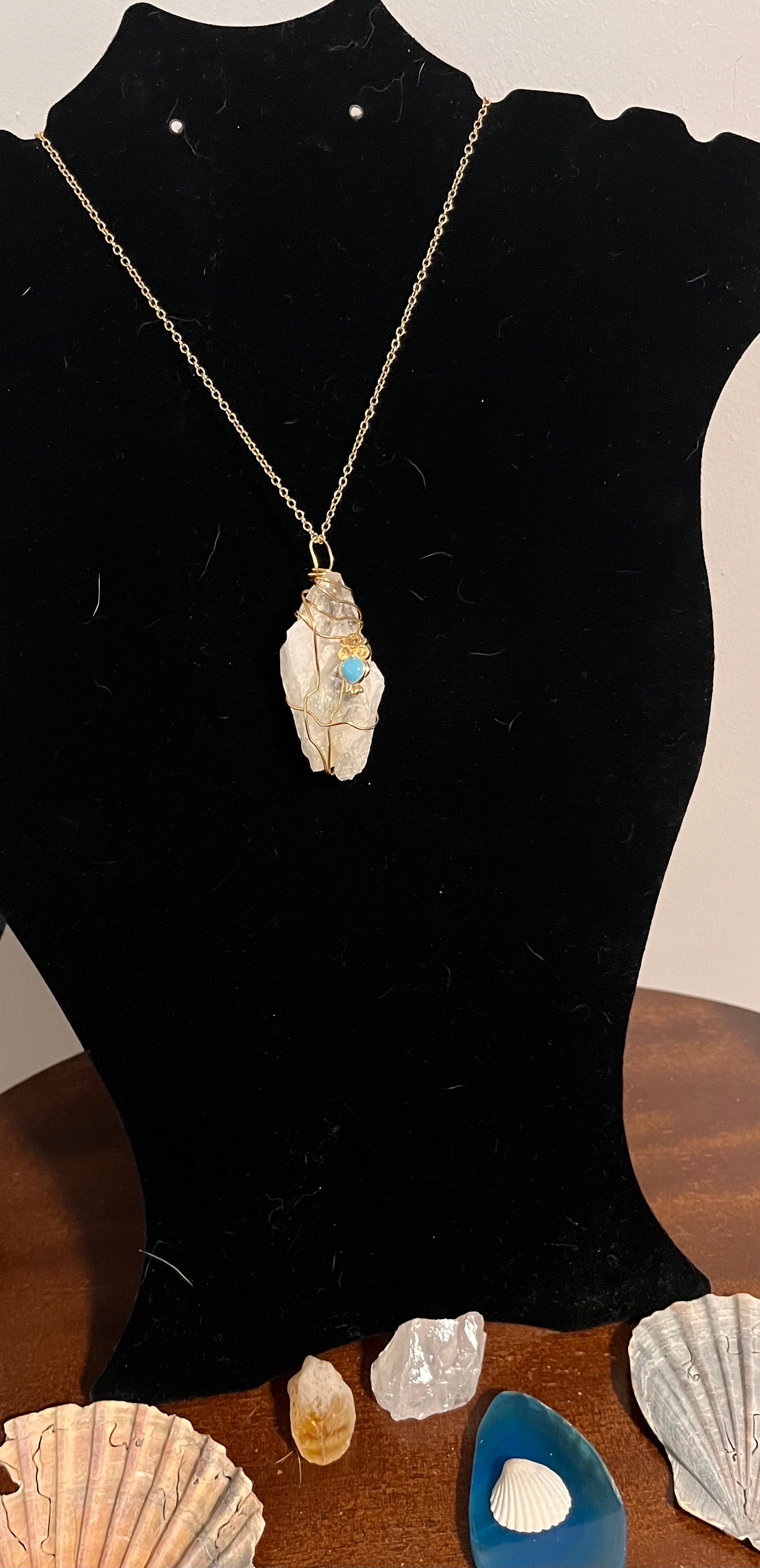 Crystal large, wrapped in gold wire with owl charm . Pendant necklace