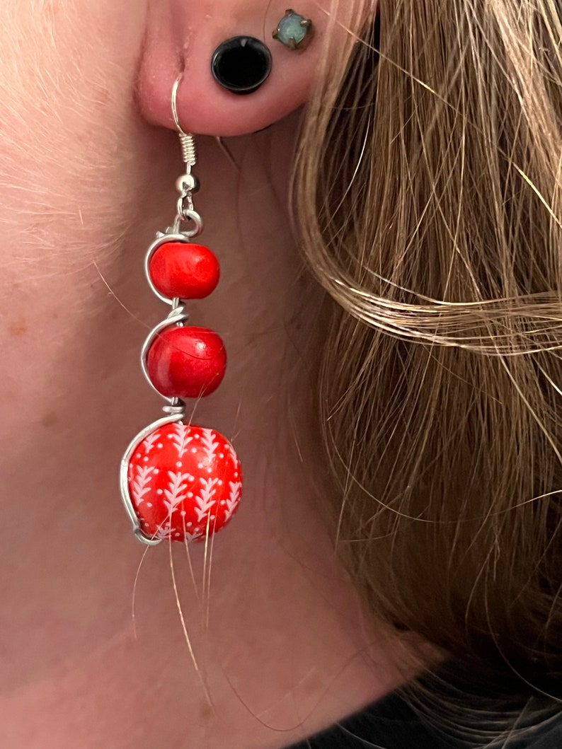 Christmas earrings wrapped in silver wire. Red winter beads. Festive earrings image 3