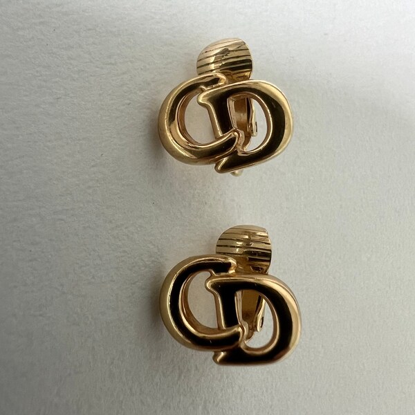 Christian Dior vintage gold tone CD logo clip on earring