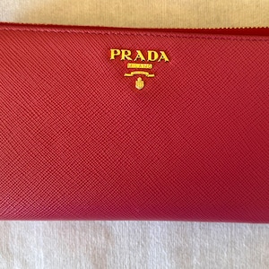 Portafoglio PRADA in pelle Saffiano color peonia con carta di autenticazione e tutte le inclusioni