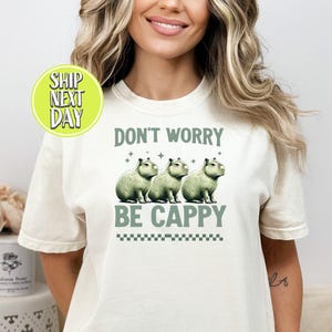 Don&#39;t Worry Be Cappy Capybara T-Shirt, Funny Capybara Shirts, Mental Health Shirt, Capybara Lovers Shirt, Ironic Silly Animal Tee  -FUN054