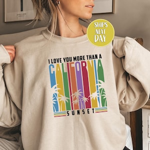 Love You More Than A California Sunset Sweatshirt, California Beach Shirt, Summer Holiday Hoodie, Music Merch, Cute Travel Shirts  -TC224