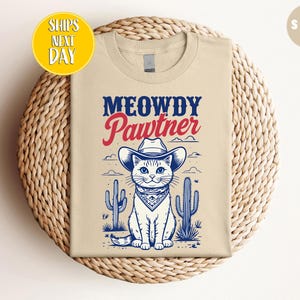 Meowdy Pawtner T-shirt, Whimsical Cat in Cowboy Hat &#39;Meowdy Pawtner&#39; T-Shirt, Cowboy Cat Shirt, Retro Cat Tee, Western Cat Lover Gift -TC221
