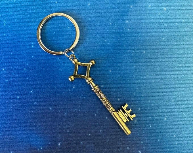 Keychan Pin Anime Pin Badge Titan Key Gold Keychain / Keyring | Pins for Anime Fans ...