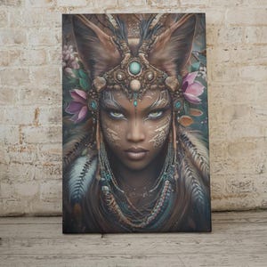 May include: A canvas print featuring a detailed portrait of a woman with fox-like ears and intricate tribal face paint. She wears a jeweled headdress, adorned with turquoise stones and feathers, and a beaded necklace. The background includes flowers and foliage.