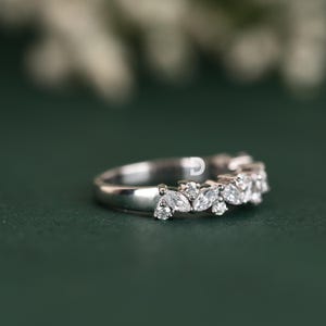 Available in 14K gold and sterling silver, this women’s gold ring is designed for durability and lasting shine. Whether you prefer the warmth of yellow gold, the sleekness of white gold, or the romantic hue of rose gold, you can select the perfect metal to complement your style. Sterling silver offers an affordable yet equally stunning option for those who love fine craftsmanship