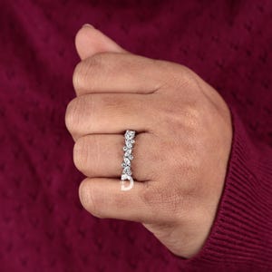 Looking for a heartfelt and symbolic gift? This diamond promise ring represents love, devotion, and the promise of a beautiful future together. Perfect for couples who want to express their commitment, it serves as a stunning reminder of a special bond between two people.