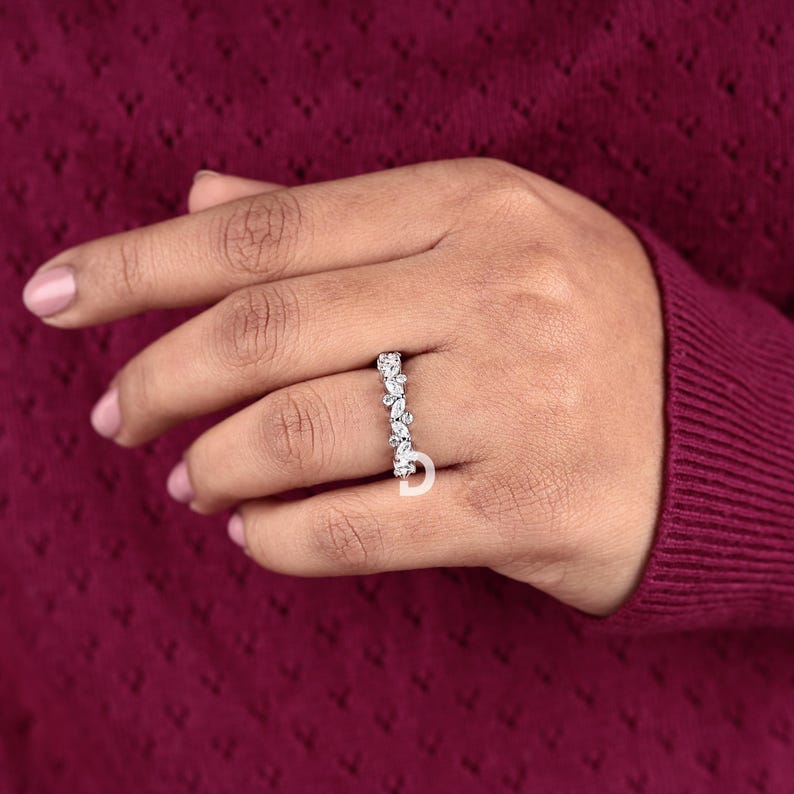 Enhance your jewelry collection with this stacking ring, designed to be worn alone or layered with other bands for a trendy, personalized look. Whether combined with engagement rings, eternity bands, or minimalist rings, this versatile piece allows you to create endless combinations while adding a sophisticated touch to any outfit.