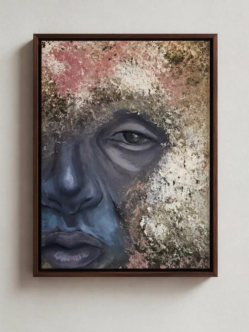 May include: A framed oil painting featuring a close-up portrait of a face rendered in shades of dark blue and purple. The surrounding area is composed of thick, textured impasto paint strokes in earthy tones of beige, brown, and muted pink.