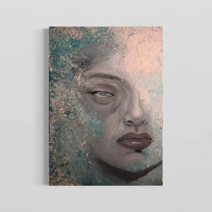 May include: A rectangular canvas painting featuring a portrait of a face rendered in shades of gray, with dark lips and eyes. The background and edges of the face are textured with blended layers of teal, turquoise, and soft peach paint.