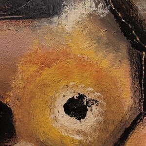 May include: An abstract oil painting on canvas featuring a central circular form in shades of yellow and orange, surrounded by a textured black border. The composition includes thick, visible brushstrokes and a prominent black center point.