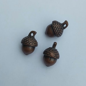 6 acorn charms, antique copper tone