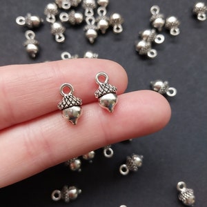 10 tiny acorn charms, antique silver tone for jewelery making