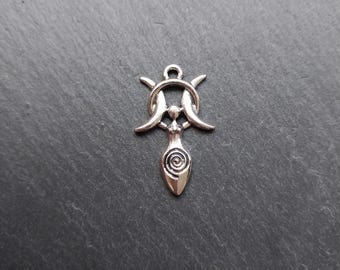 May include: Silver charm pendant featuring a triple moon symbol with a stylized female figure in the center. The figure is standing with arms raised and a spiral design in the center of the pendant.