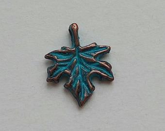10 or 50 little maple leaf charms, antique copper with blue patina,