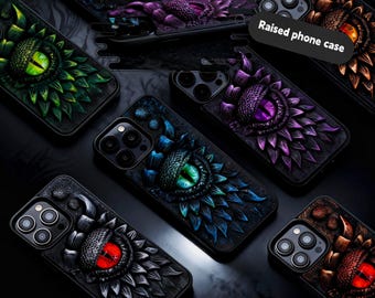 May include: Black raised phone cases with detailed eye designs in various colors, including green, blue, purple, and red. The cases have a textured, three-dimensional appearance, with the text "Raised phone case" visible.