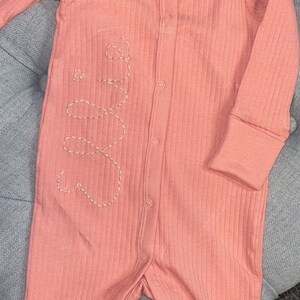 Custom embroidered baby outfit