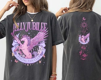 May include: A gray oversized t-shirt with a graphic print of a pink winged unicorn and the text "Jelly Jubilee Official Fan Club". The back of the shirt has a graphic print of a winged unicorn, a crescent moon, a sun, and other celestial symbols.