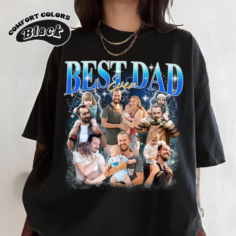 May include: Black t-shirt with a graphic print of a group of people and the text "Best Dad Ever" in blue and white.