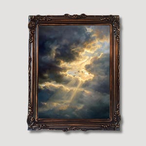 May include: An ornate, framed painting depicts a dramatic sky scene. Dark, stormy clouds contrast with a bright, sunlit area, where a flock of birds flies. The frame is a dark, antique brown with detailed carvings.