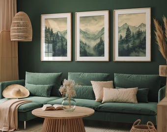 May include: A living room with a green sofa, pillows, and a wooden coffee table. Three framed landscape art prints hang above the sofa. A woven pendant light and a straw hat add to the decor.