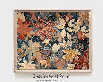 May include: A framed print of a colorful abstract design featuring a variety of leaves in shades of red, orange, yellow, and green on a dark blue background. The print is titled "Inspire With Print" and includes the text "Printable Wall Art".