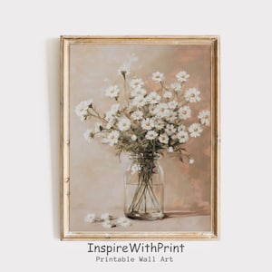 May include: A painting of a bouquet of white daisies in a clear glass jar on a light brown background.