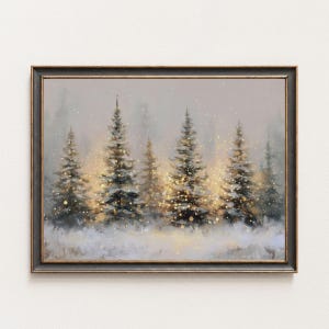 May include: A framed painting of a winter forest scene. Several evergreen trees are covered in snow, with golden light shining through the trees. The painting has a muted colour palette with a dark frame.